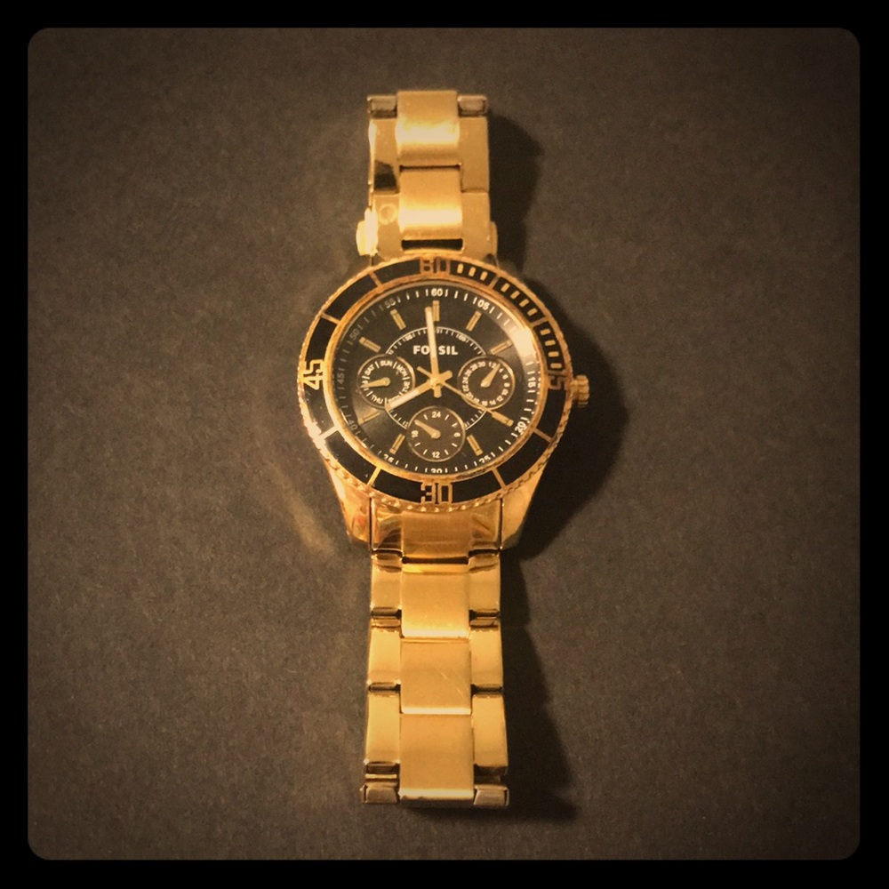 Gold fossil watch